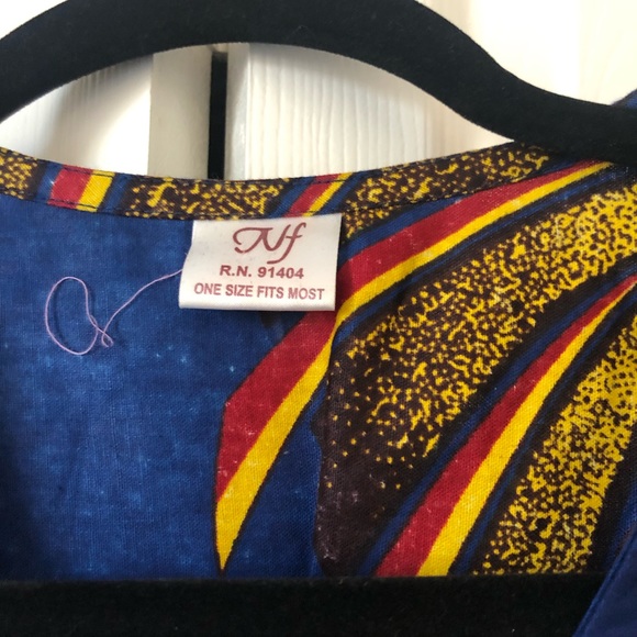 Dazzling blue ethnic print wrap dress - Picture 2 of 6